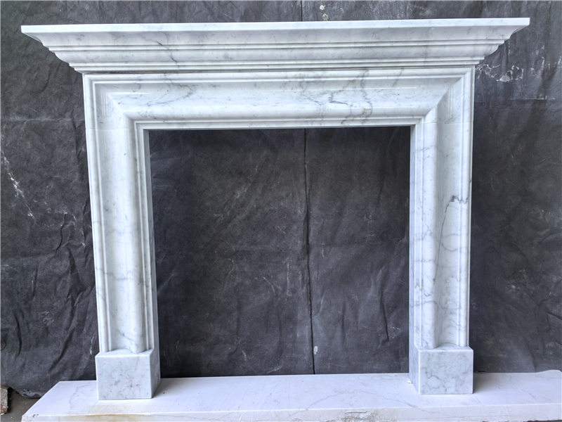 Carrara marble Bolection with shelf / marble fireplace manufacturer
